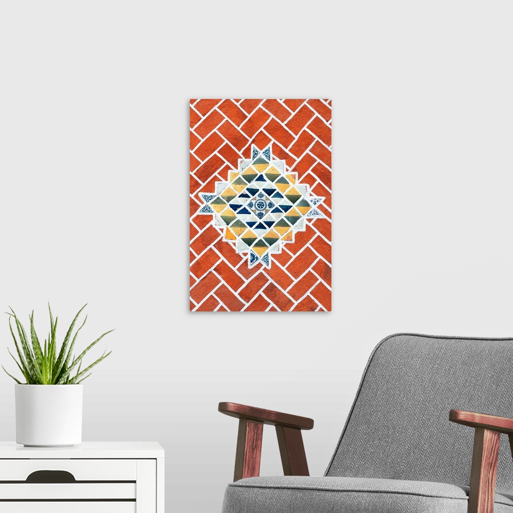A modern room featuring Decorative photograph of talavera tile creating a mosaic pattern surrounded by brick. From the Vi...