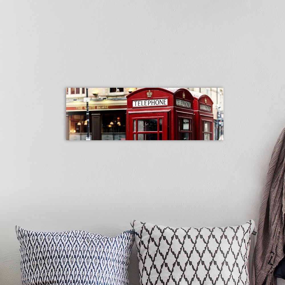 A bohemian room featuring Fine art photograph of an iconic red phone booth in London, England.