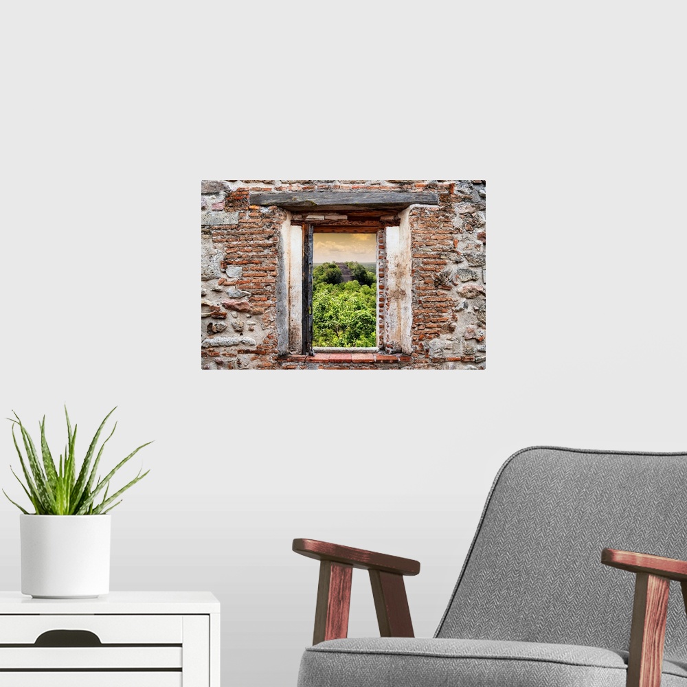 A modern room featuring View of the Ruins of the ancient Mayan City of Calakmul, Mexico, framed through a stony, brick wi...