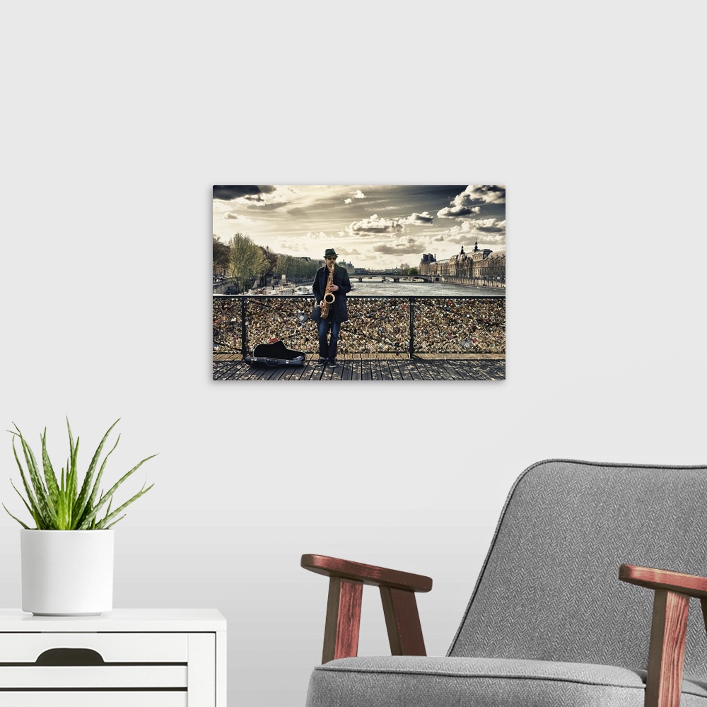 A modern room featuring Fine art photo of a man playing the saxophone on bridge covered in locks in Paris, France.