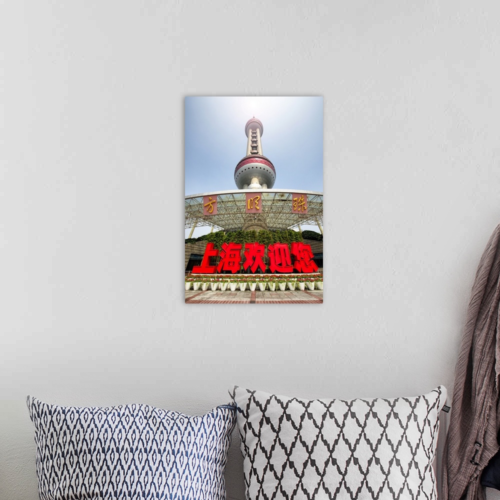 A bohemian room featuring Shanghai Oriental Pearl Tower, China 10MKm2 Collection.