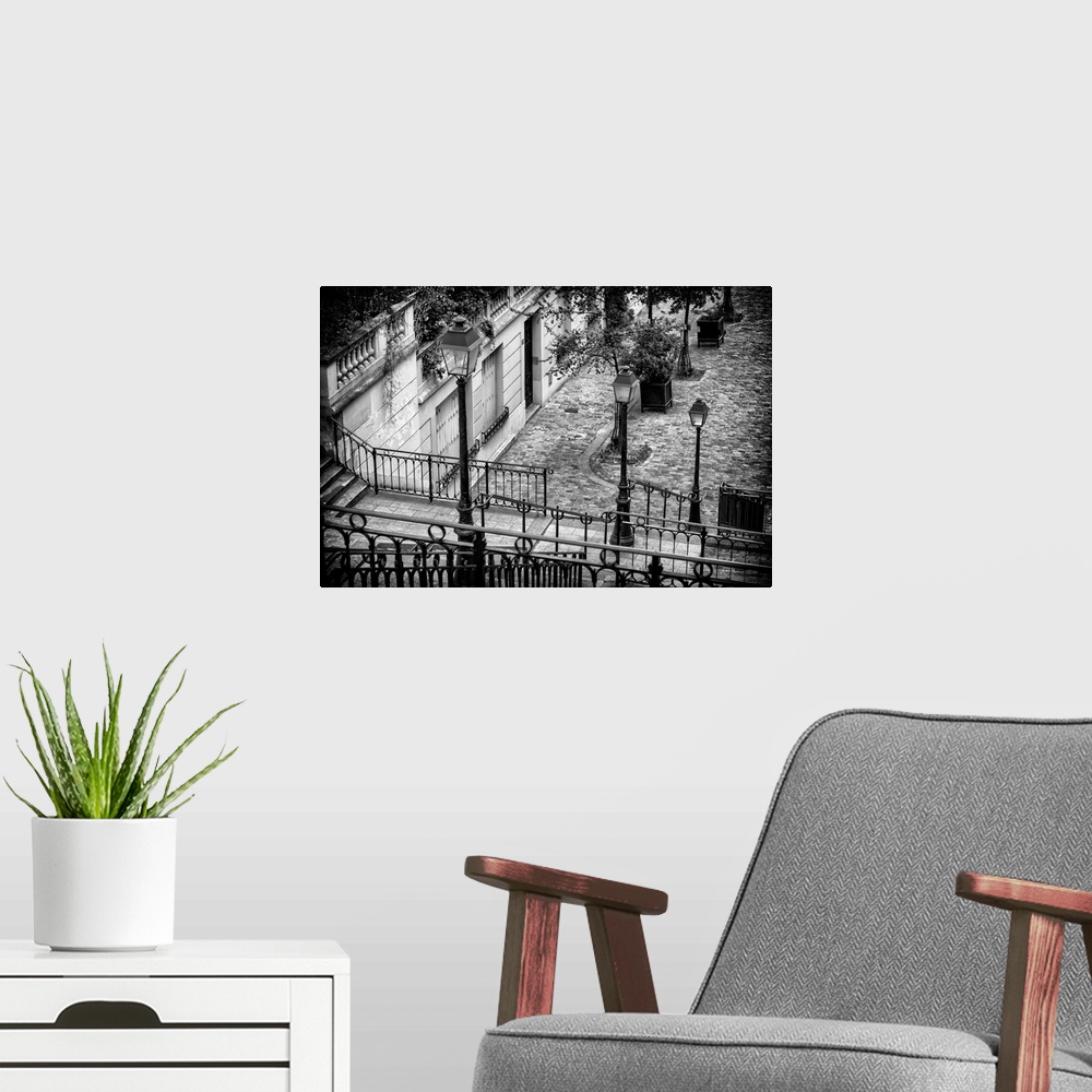 A modern room featuring A photograph of a Parisian architecture in Montmarte.