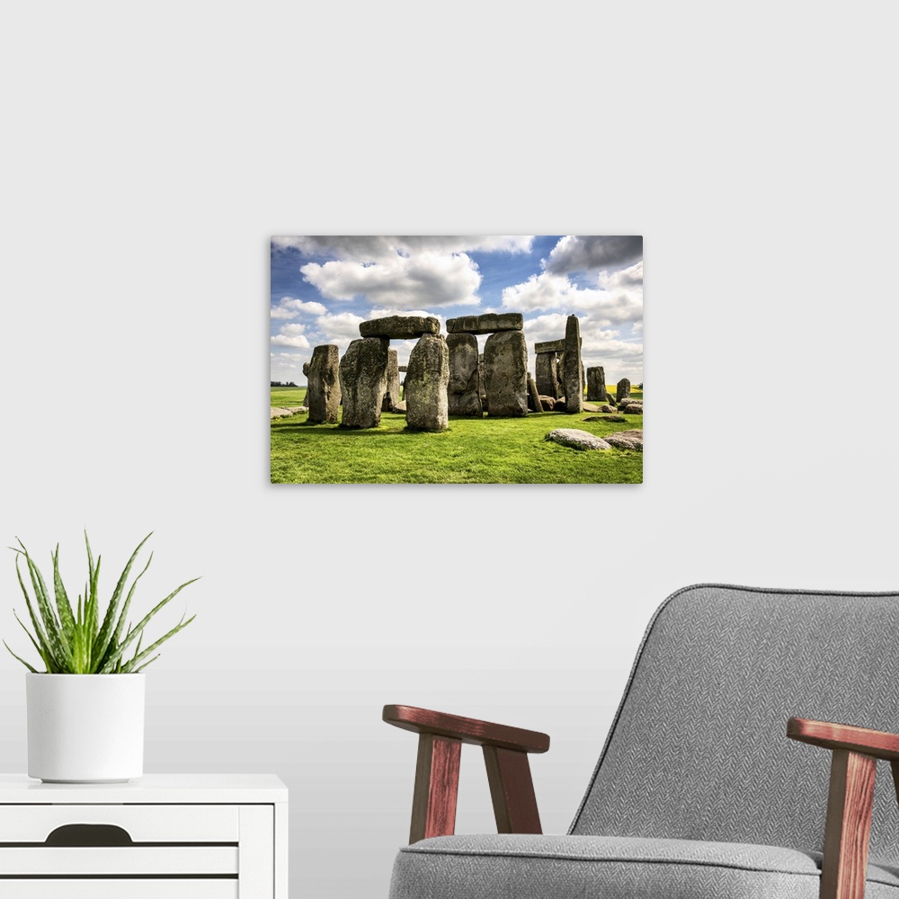 A modern room featuring Fine art photograph of the prehistoric monument of Stonehenge.