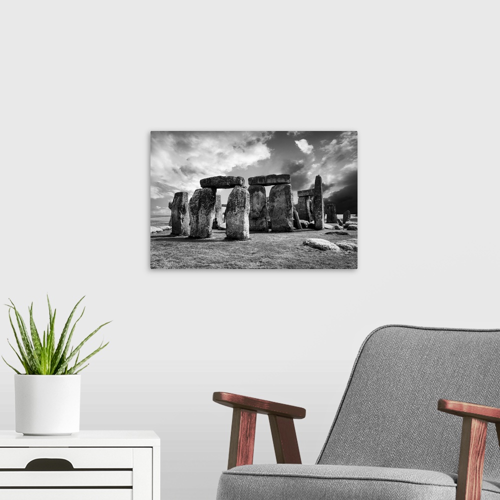 A modern room featuring Fine art photograph of the prehistoric monument of Stonehenge.