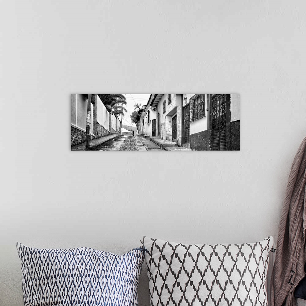 A bohemian room featuring Black and white panoramic photograph of a streetscape at San Cristobal de Las Casas in Chiapas, M...