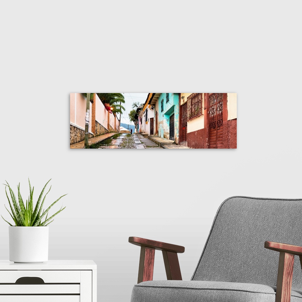 A modern room featuring Colorful panoramic photograph of a streetscape at San Cristobal de Las Casas in Chiapas, Mexico. ...