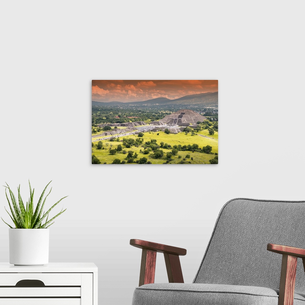 A modern room featuring Aerial photograph of the Teotihuacan Pyramids, Mexico, featuring the Pyramid of the Sun and an or...