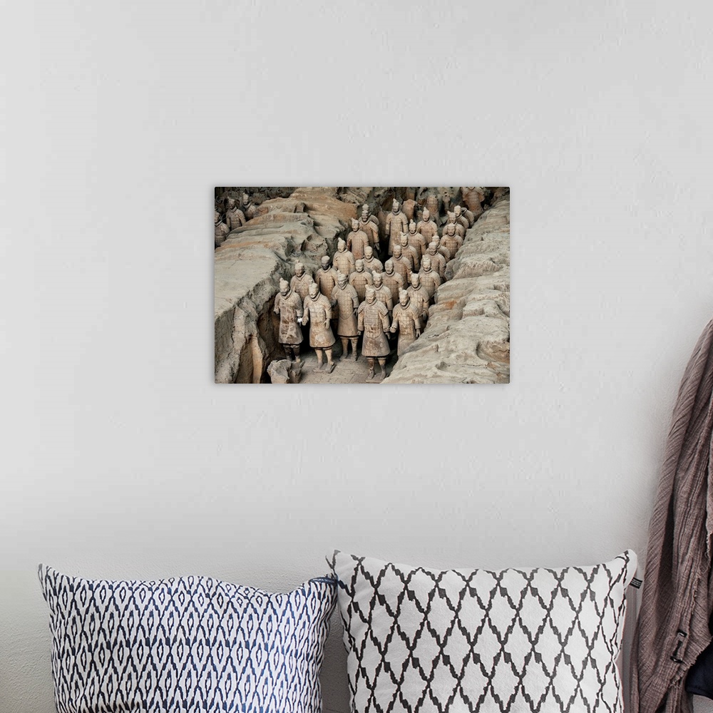 A bohemian room featuring Terracotta Army, China 10MKm2 Collection.