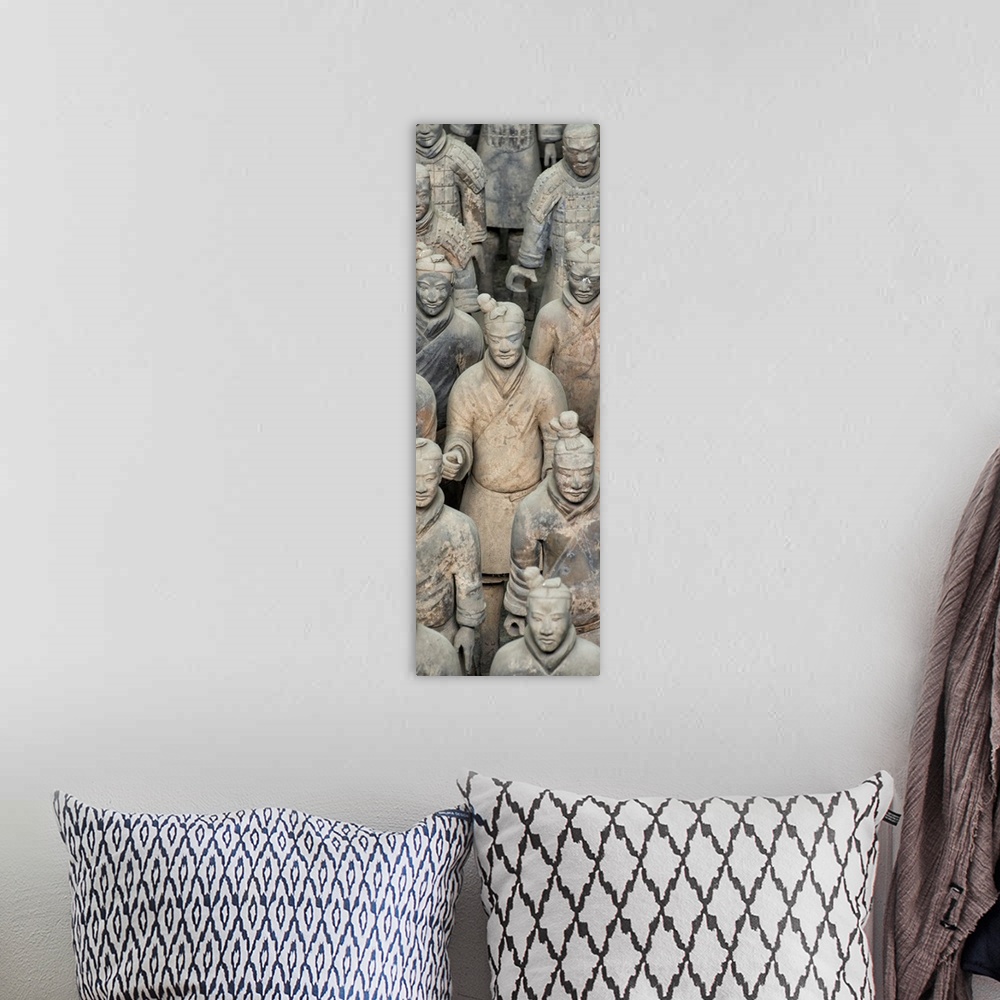 A bohemian room featuring Terracotta Army, China 10MKm2 Collection.