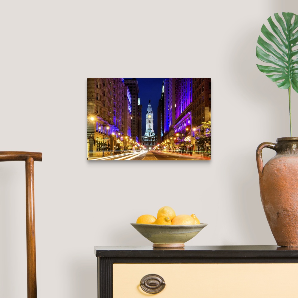 A traditional room featuring Fine art photograph of City Hall in Philadelphia in the evening, with light trails in the street.