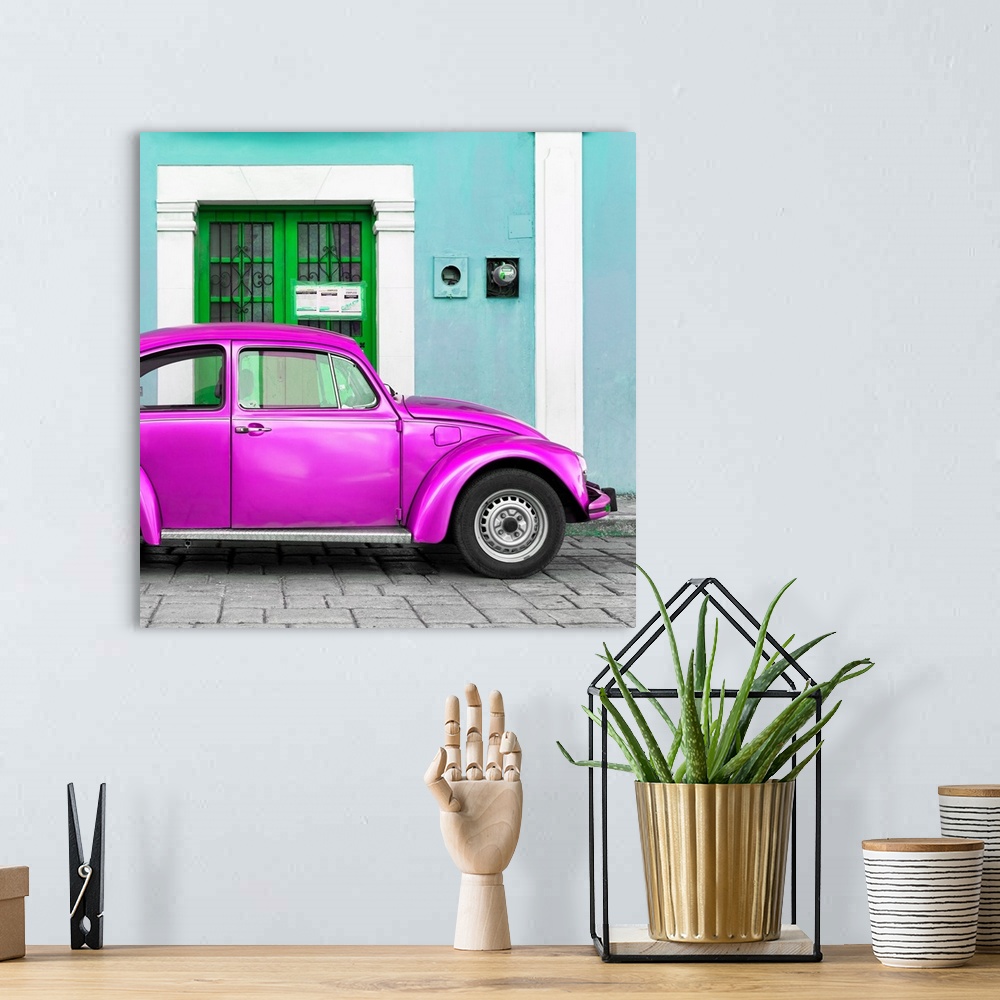 A bohemian room featuring Square photograph of a classic Volkswagen Beetle parked in front of a turquoise building with a b...