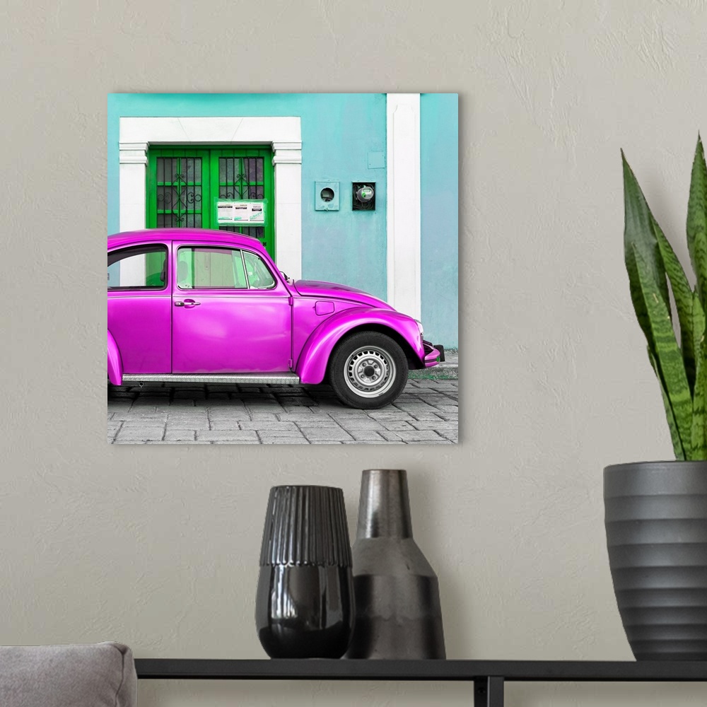A modern room featuring Square photograph of a classic Volkswagen Beetle parked in front of a turquoise building with a b...