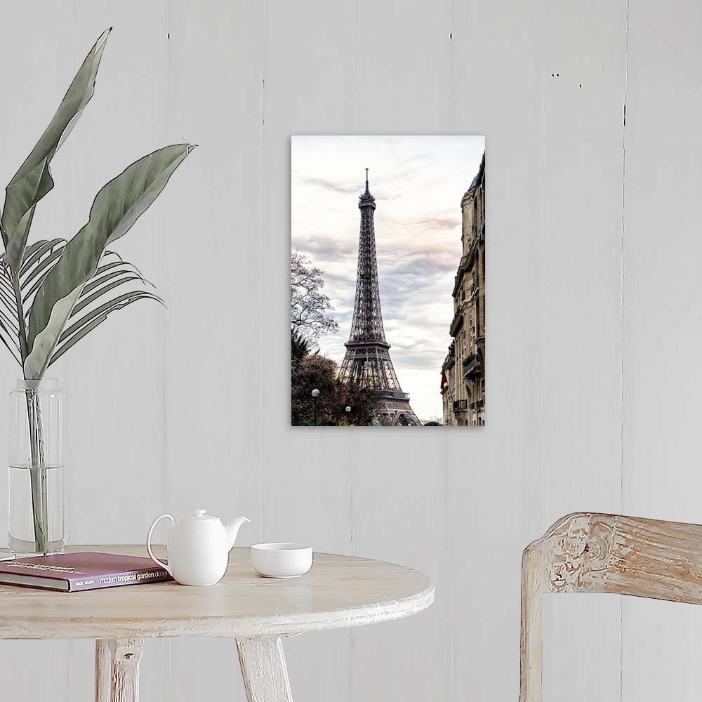 A farmhouse room featuring View of the famous Eiffel Tower monument in Paris, France, against an overcast sky.