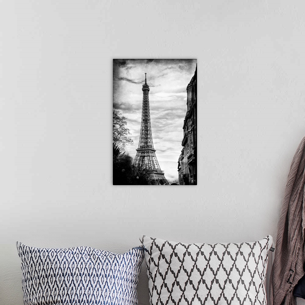 A bohemian room featuring View of the famous Eiffel Tower monument in Paris, France, against an overcast sky.