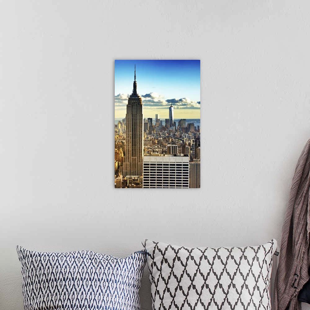 A bohemian room featuring Beautiful view of the New York skyline with the Empire State Building and One World Trade in the ...