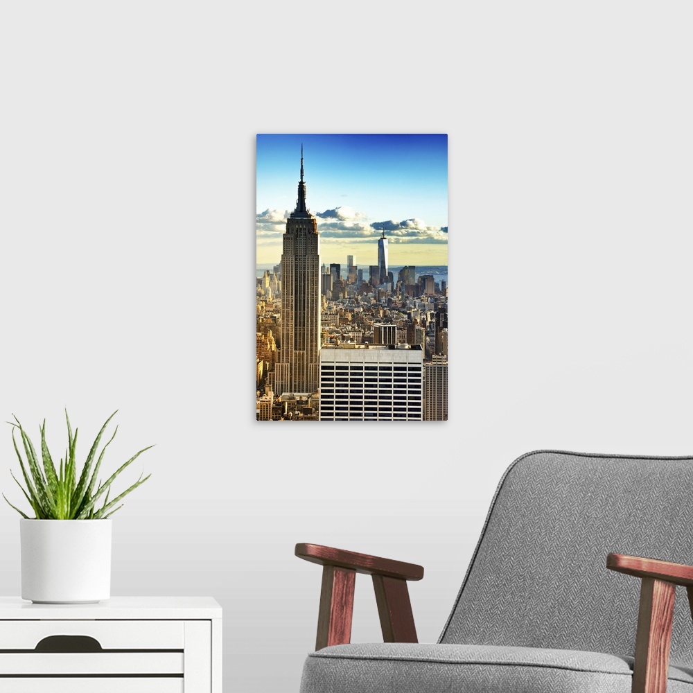 A modern room featuring Beautiful view of the New York skyline with the Empire State Building and One World Trade in the ...