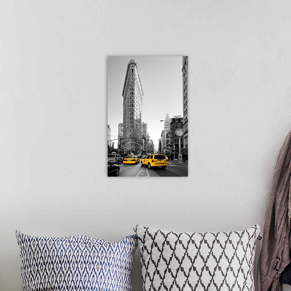 A bohemian room featuring Fine art photo of the Flatiron Building, seen from the street, with yellow taxi cabs.