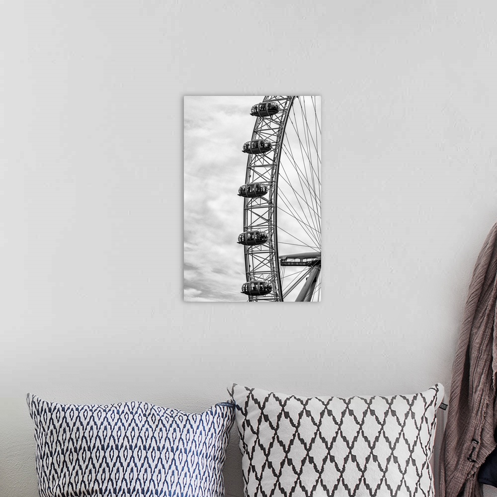 A bohemian room featuring Fine art photograph of a section of the Millennium Wheel in London, England.