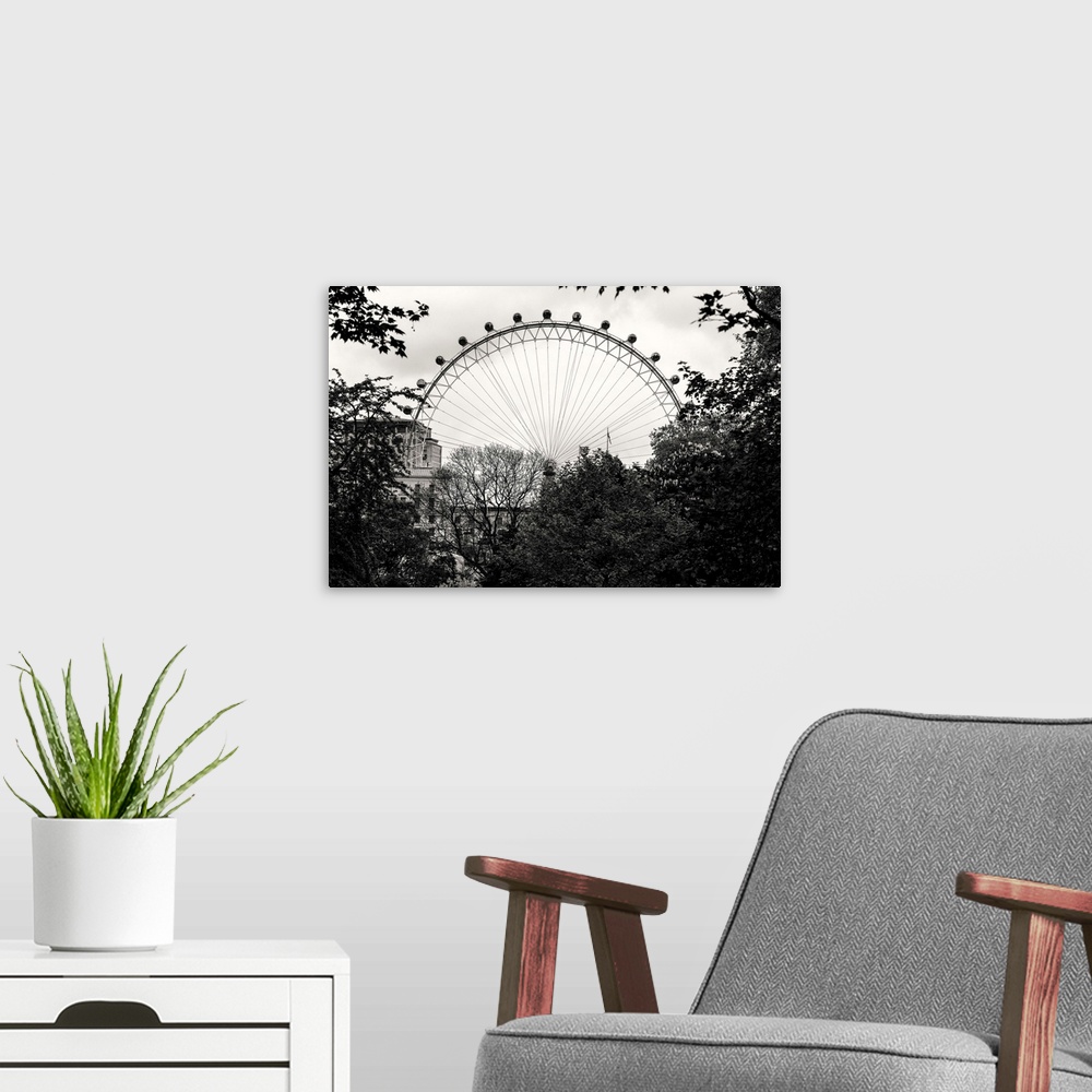 A modern room featuring Black and white photo of the London Eye behind trees in London, England.