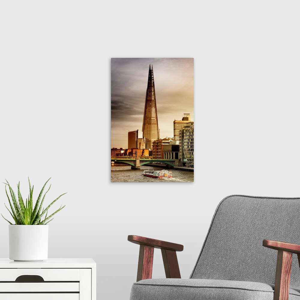 A modern room featuring Fine art photo of the pyramid-like structure of the Shard in Southwark, London.