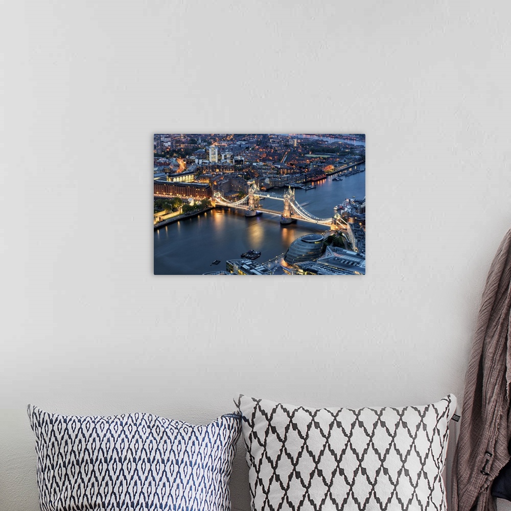 A bohemian room featuring Fine art photo of the River Thames and the Tower Bridge lit up in the evening.