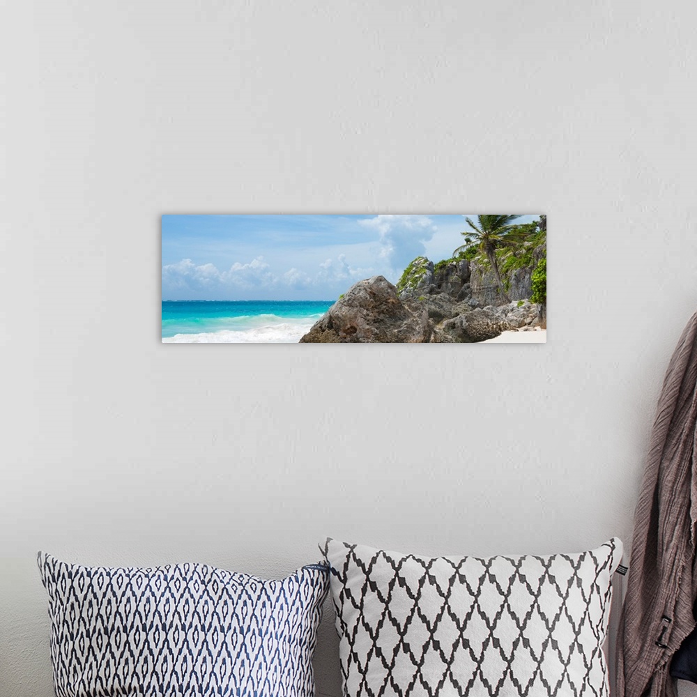 A bohemian room featuring Panoramic photograph of a rocky Caribbean beach shore in Tulum, Mexico. From the Viva Mexico Pano...