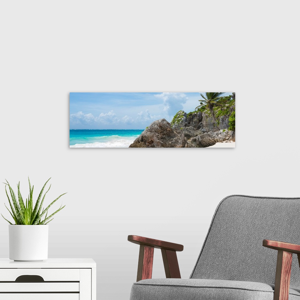 A modern room featuring Panoramic photograph of a rocky Caribbean beach shore in Tulum, Mexico. From the Viva Mexico Pano...