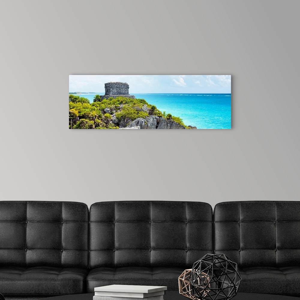 A modern room featuring Panoramic photo of ancien Mayan ruins in Tulum, Mexico, overlooking the clear blue Caribbean ocea...