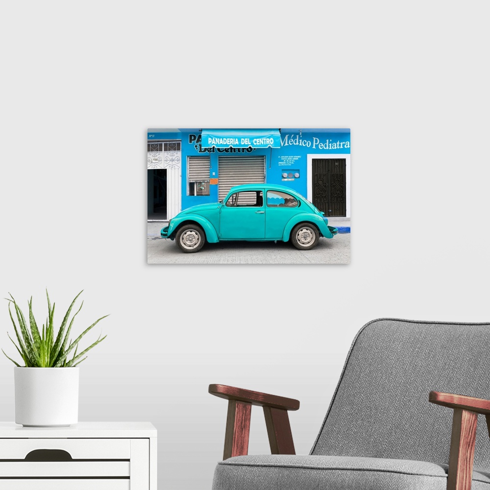A modern room featuring Photograph of a turquoise Volkswagen Beetle parked in front of a blue building. From the Viva Mex...