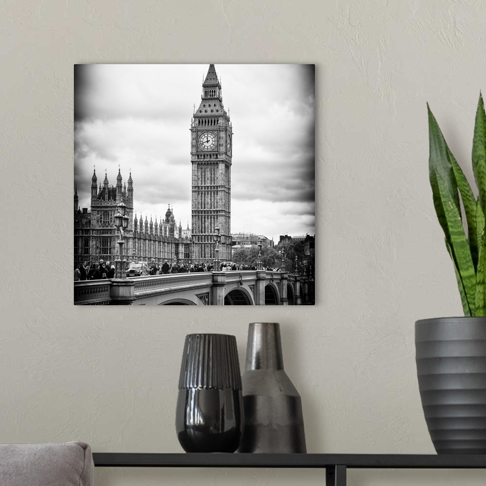 A modern room featuring Black and white photo with dramatic lighting of the Big Ben clock tower.