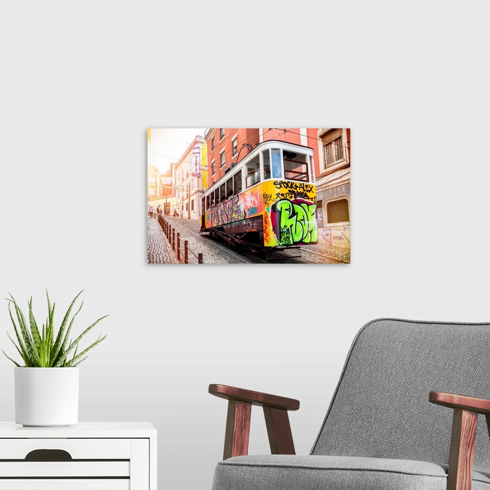 A modern room featuring It's the Gloria funicular with graffiti that connects Baixa to Bairo Alto, in the historic center...