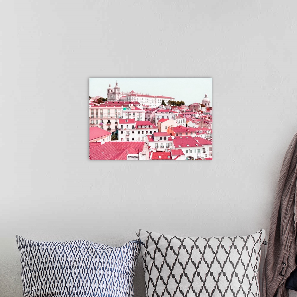 A bohemian room featuring It's a beautiful view of Lisbon's colorful rooftops and pink facades in Portugal.