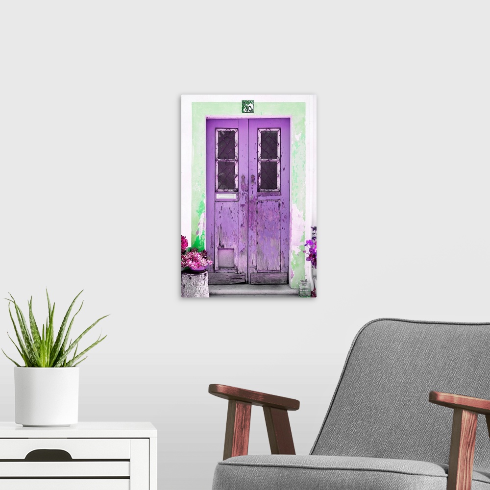 A modern room featuring It's an old purple door entrance to a traditional house in Portugal.
