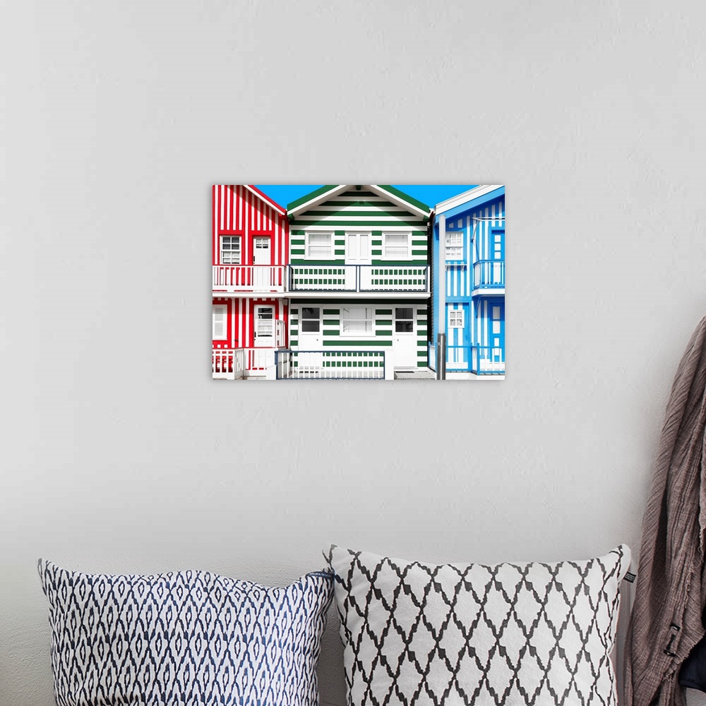 A bohemian room featuring It's the beautiful colourful striped beach houses of Costa Nova in Portugal.