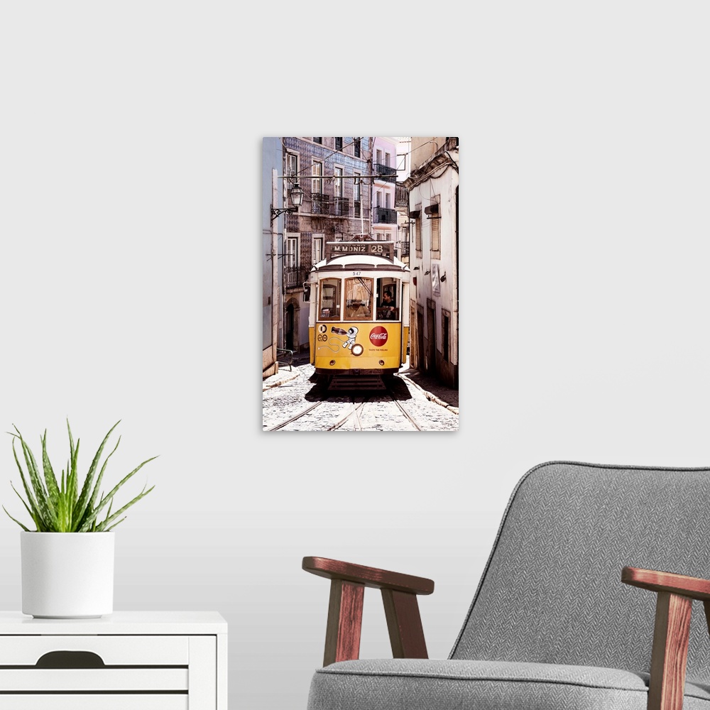 A modern room featuring It's a typical Lisbon street with old Facades and the famous old yellow tramway 28 in Portugal.