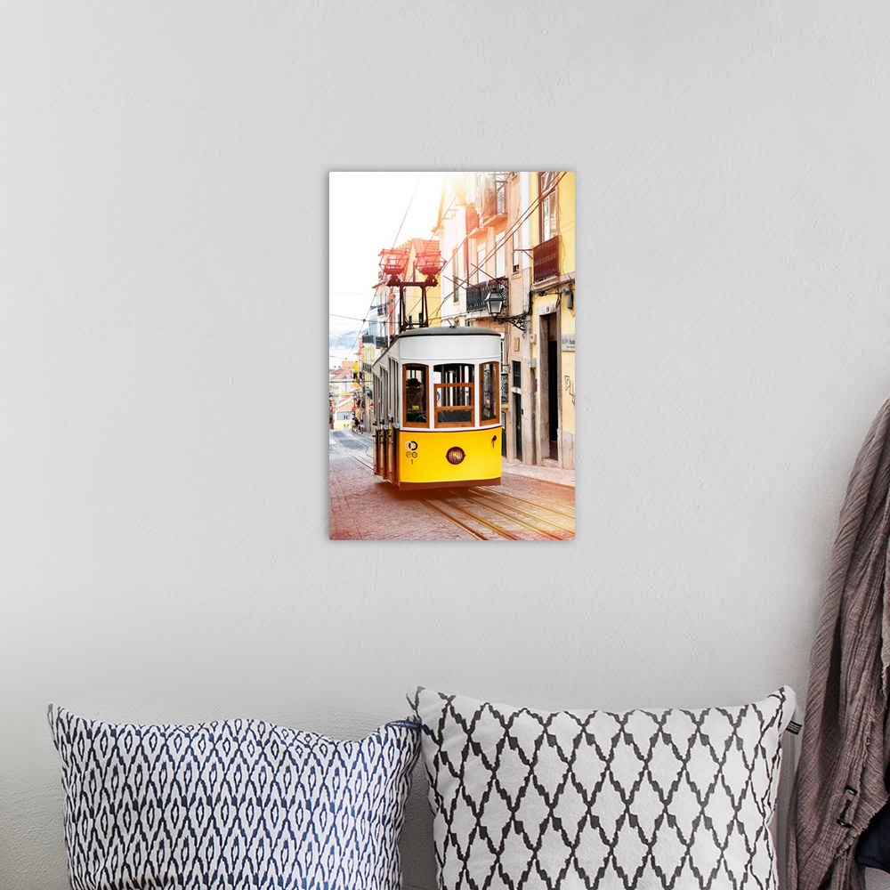 A bohemian room featuring It's the funicular of Bica in the district of Bairro Alto, the most symbolic yellow tram of Lisbo...