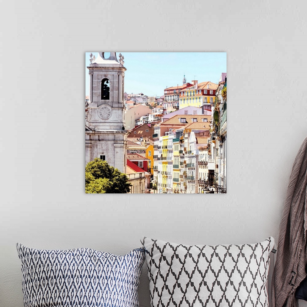 A bohemian room featuring It's a beautiful view of a street in Lisbon with colorful facades in Portugal.