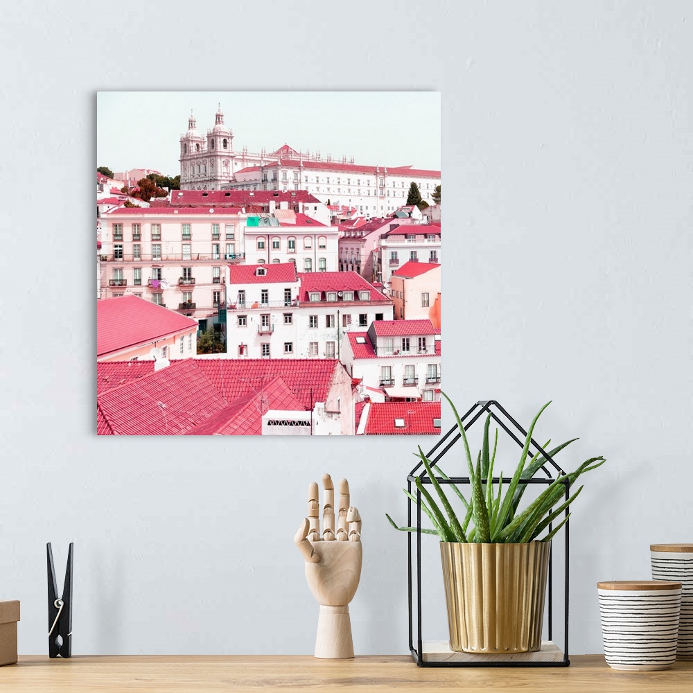 A bohemian room featuring It's a beautiful view of Lisbon's colorful rooftops and pink facades in Portugal.