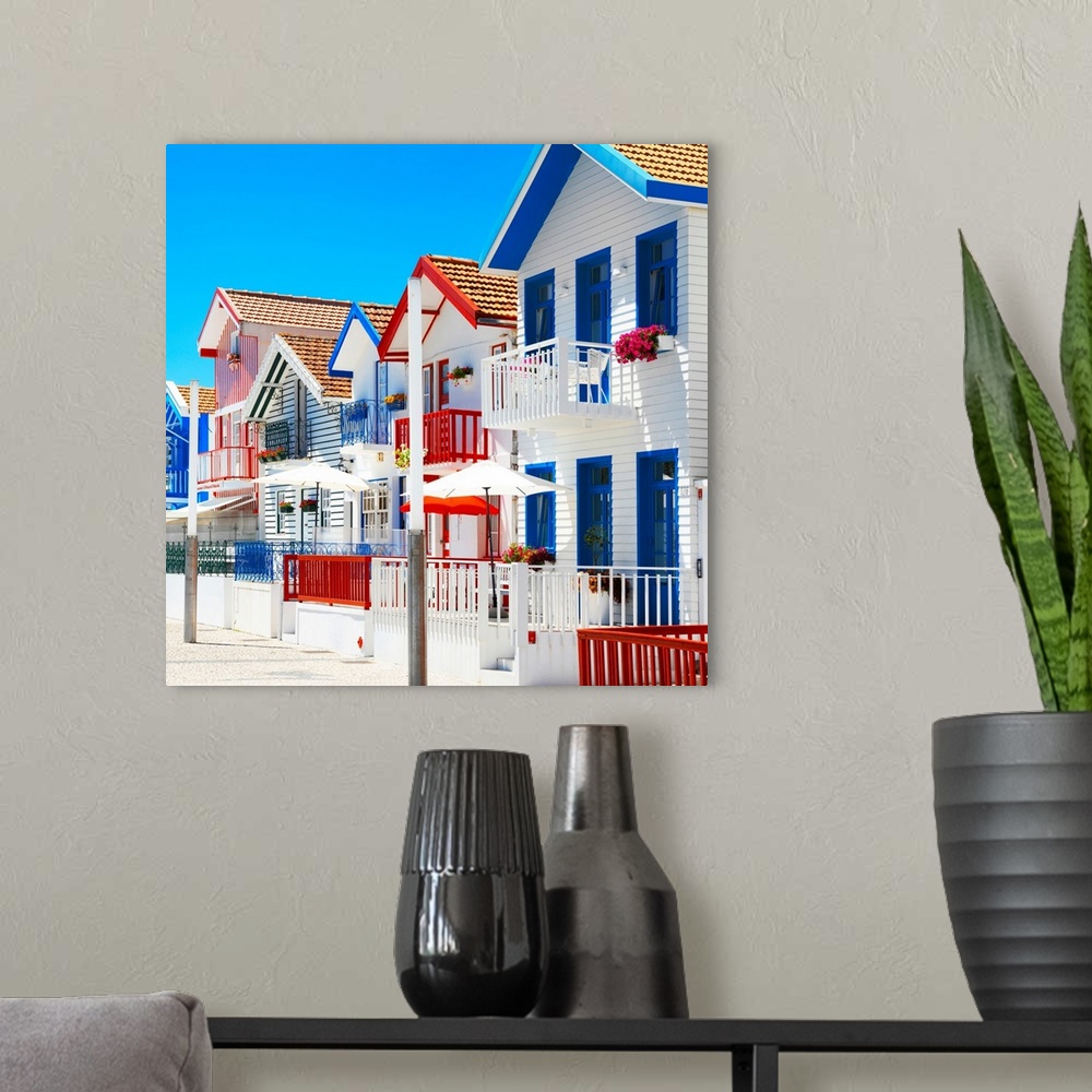 A modern room featuring These are colorful white houses with stripes in Costa Nova Beach, Portugal.