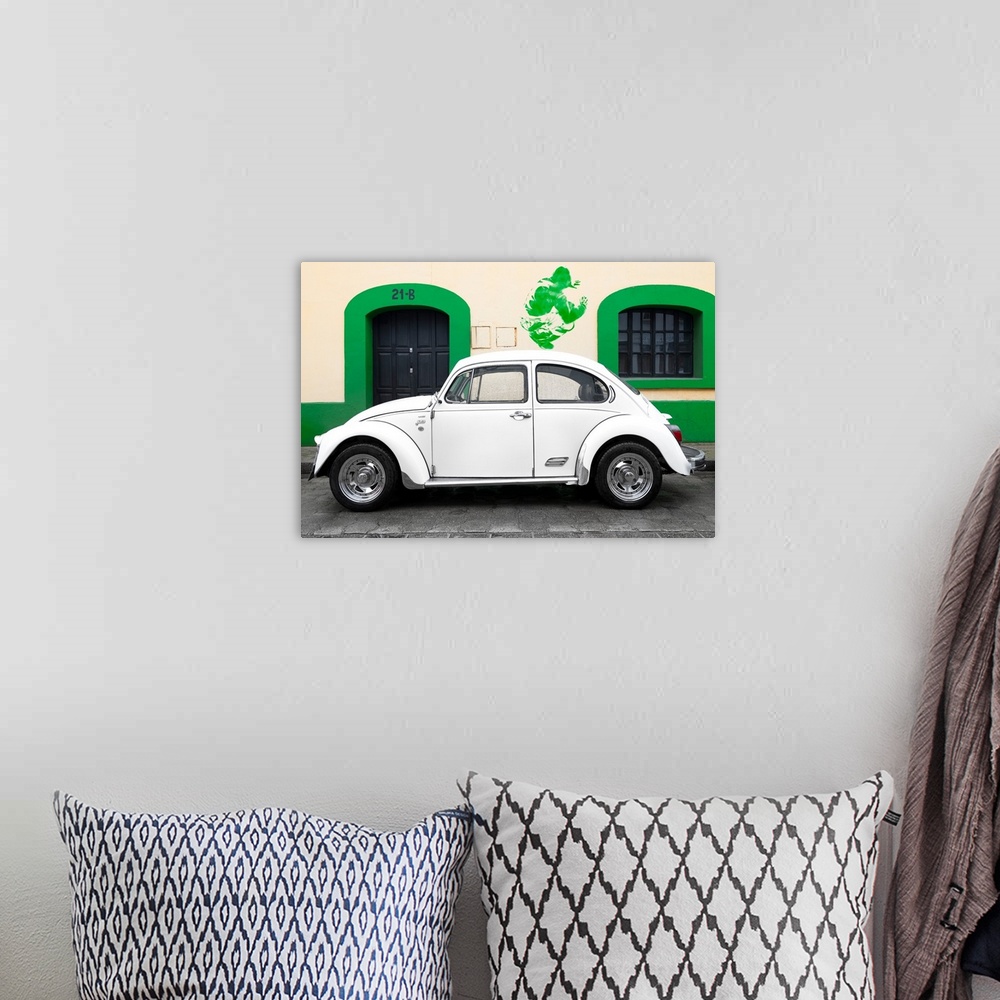 A bohemian room featuring Photograph of a classic white Volkswagen Beetle parked in front of a building with a green trim w...