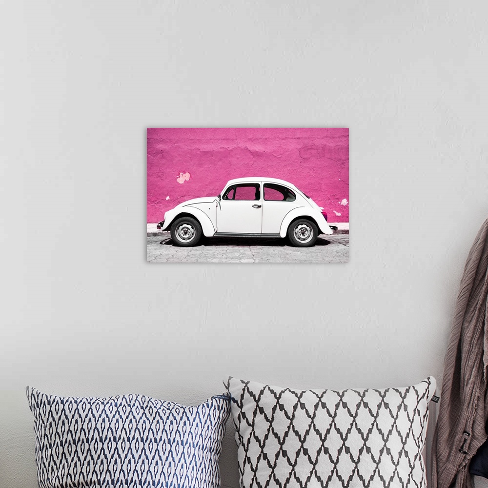A bohemian room featuring Photograph of a class white Volkswagen Beetle parked in front of a bright pink wall in Mexico. Fr...