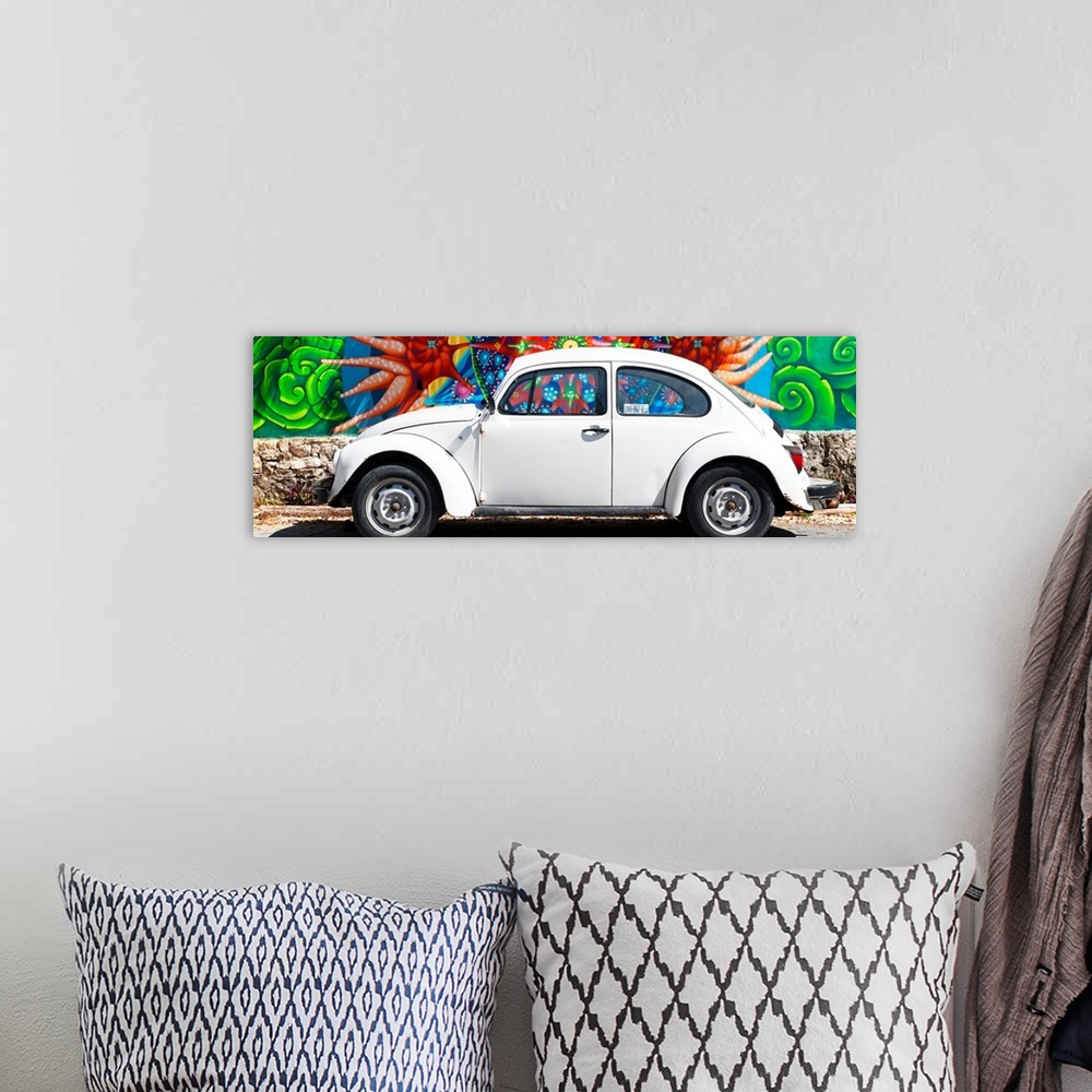 A bohemian room featuring Panoramic photograph of a classic white Volkswagen Beetle parked in front of a colorful wall full...
