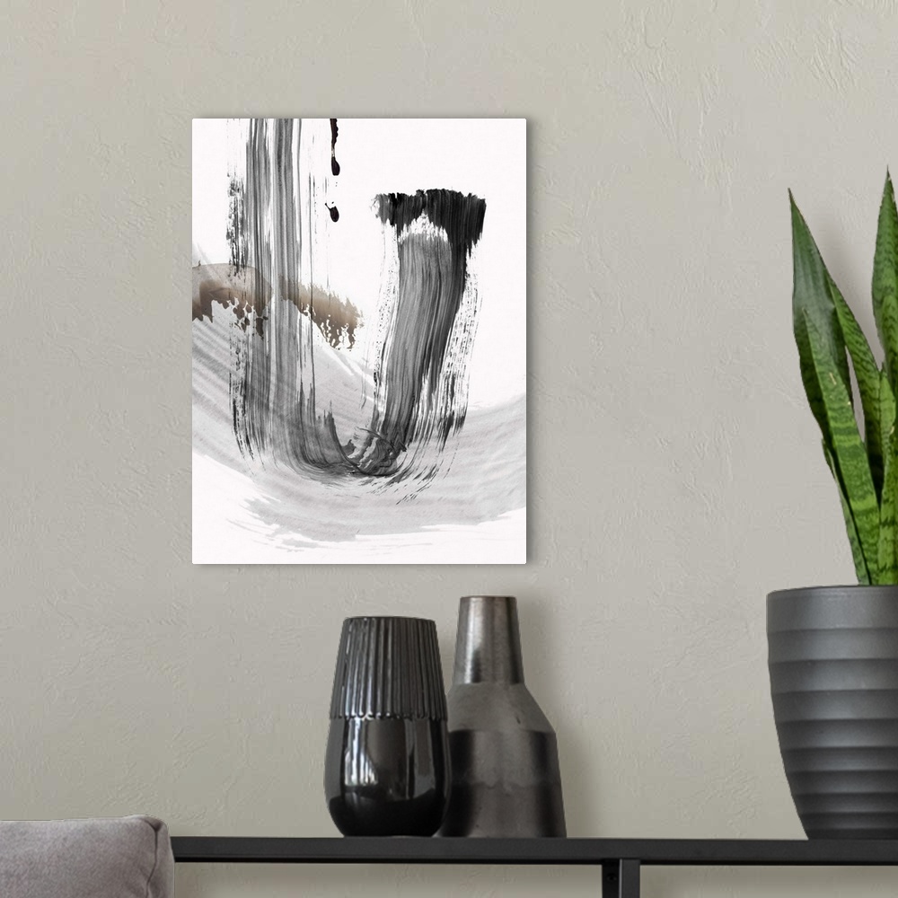 A modern room featuring vertical abstract painting with brush strokes of gray and black.