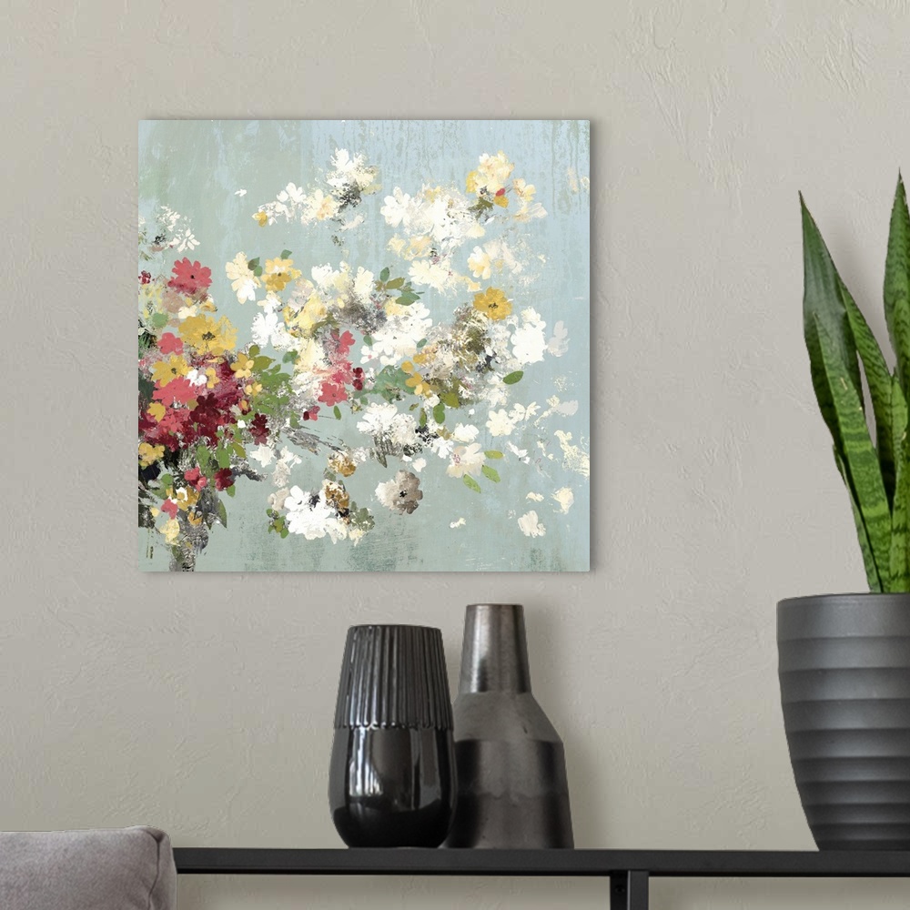 A modern room featuring Contemporary floral artwork in neutral shades of yellow, green, red, and white on pale blue.