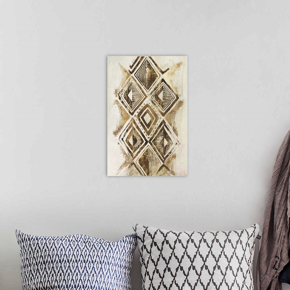 A bohemian room featuring Vertical abstract art with decorative metallic gold geometric diamond shapes on a light gold and ...