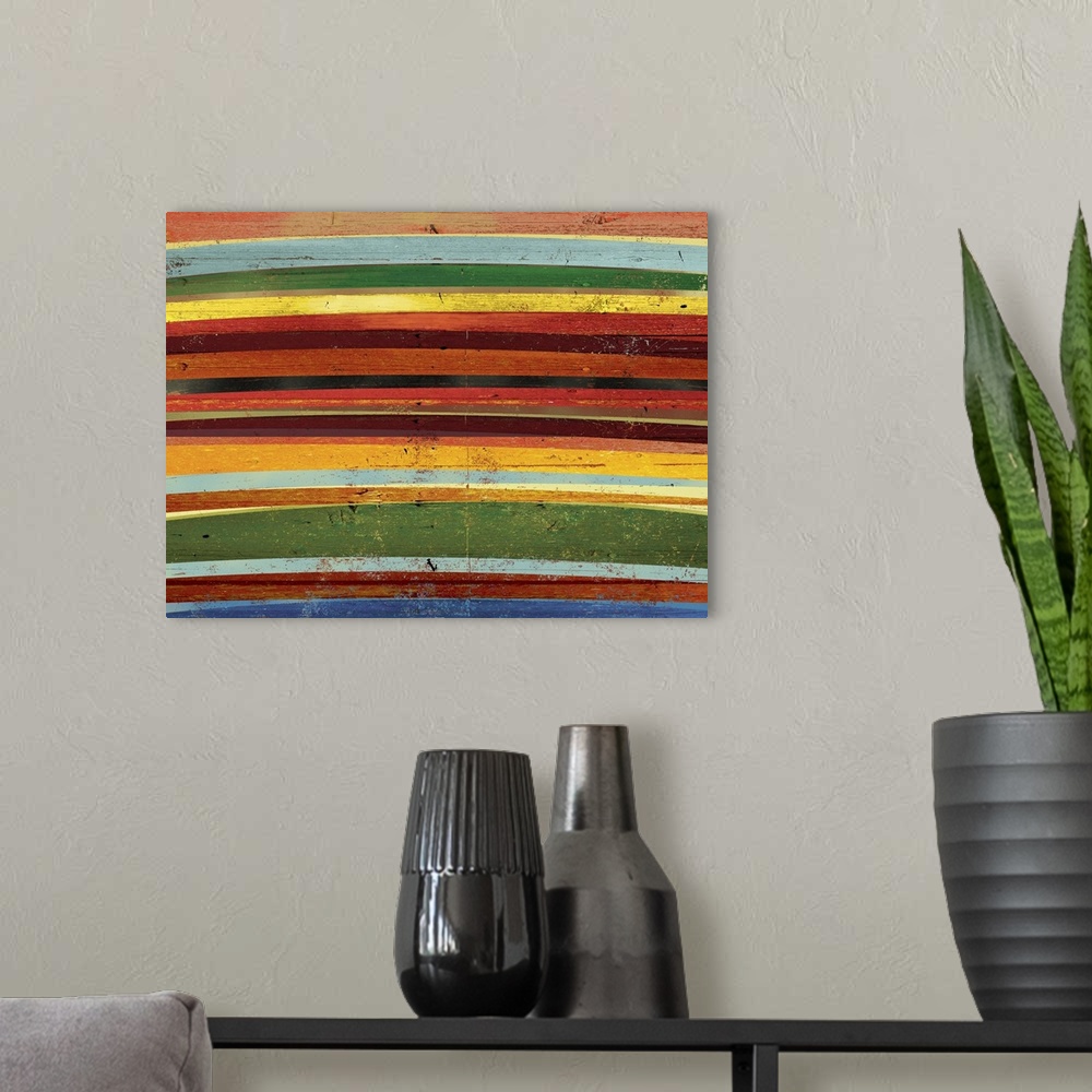 A modern room featuring Contemporary abstract home decor artwork of colorful horizontal stripes.