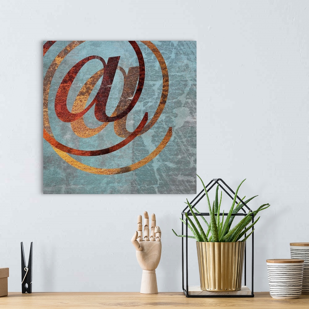 A bohemian room featuring The At symbol on a grey weathered background.