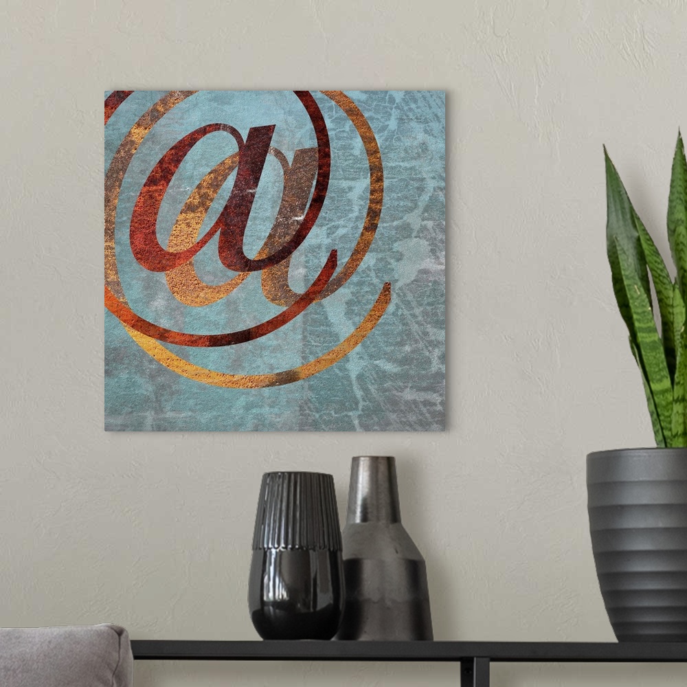 A modern room featuring The At symbol on a grey weathered background.
