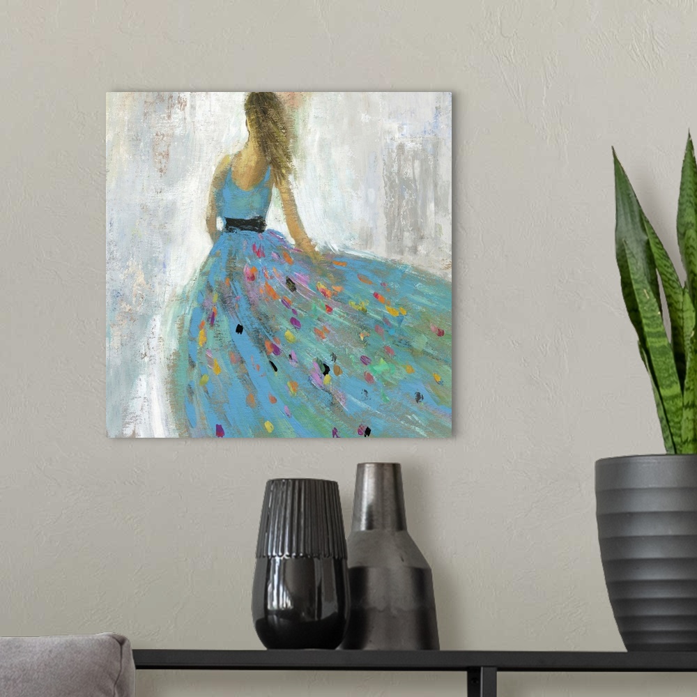 A modern room featuring Square painting of a female in a blue ball gown with multiple color spots on the skirt.