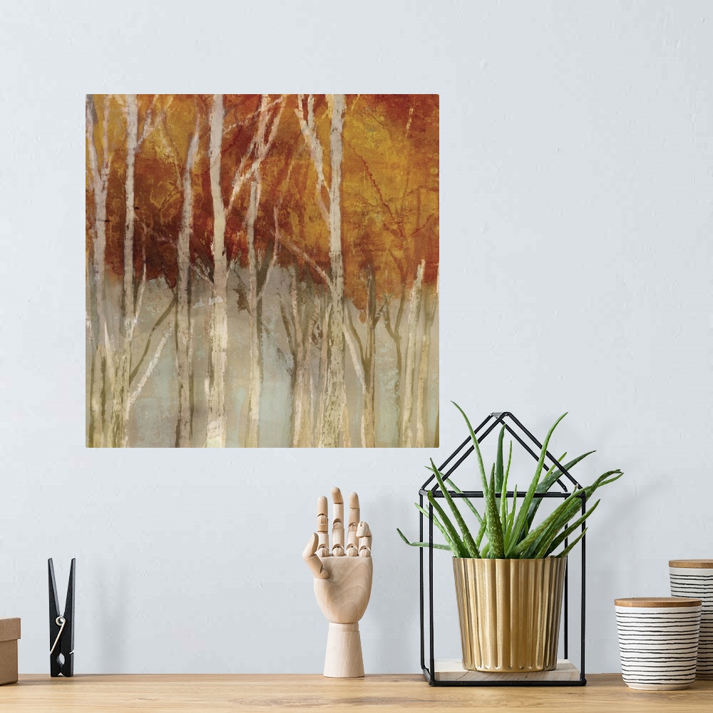 A bohemian room featuring Contemporary home decor artwork of a forest in autumn foliage.